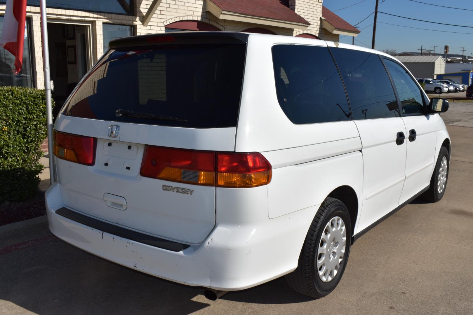 2003 White /Gray Honda Odyssey (5FNRL18513B) , located at 5925 E. BELKNAP ST., HALTOM CITY, TX, 76117, (817) 834-4222, 32.803799, -97.259003 - Photo#4